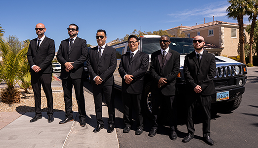 Chauffeurs with a limo